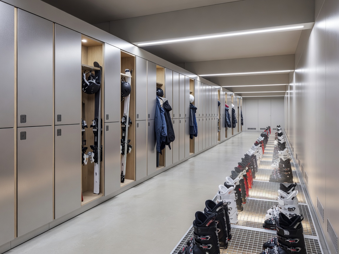 Organised ski locker facility and boot dry corridor inside modern alpine station